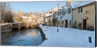 Framed Buildings along snow covered street, Castle Combe, Wiltshire, England