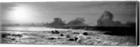 Framed Waves breaking on rocks in the ocean in black and white, Oahu, Hawaii