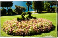 Framed Topiary and flower bed in a garden, Villa Carlotta, Tremezzo, Como, Lombardy, Italy