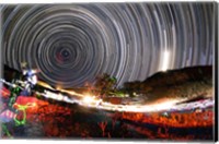 Framed Astronomers observe polar star trails above a mountain in Iran