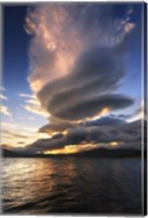 Framed massive stacked lenticular cloud over Tjedsundet in Troms County, Norway
