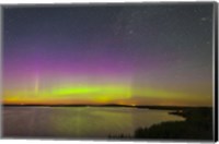 Framed faint aurora over Crawling Lake reservoir, Bassano, Alberta, Canada