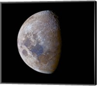 Framed crescent moon past first quarter in color