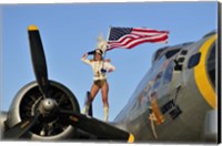 Framed 1940's style majorette pin-up girl on a B-17 bomber with an American flag