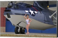 Framed pin-up girl posing with a Catalina seaplane