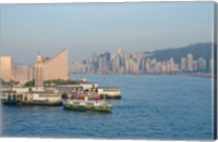 Framed Kowloon ferry terminal and clock tower, Hong Kong, China