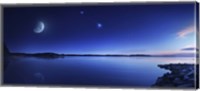 Framed Tranquil lake against starry sky, moon and falling meteorite, Finland