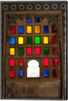 Framed Brightly colored glass window, City Palace, Udaipur, Rajasthan, India.
