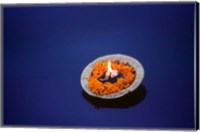 Framed Flower candle in the Ganges River, Varanasi, India