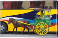 Framed Horse cart walk by colorfully painted bus, Manila, Philippines