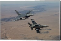 Framed Two F-16's on a training mission over the Arizona desert