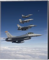 Framed Four F-16's Fly in Formation During a Training Mission