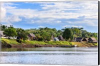 Framed Houses along a riverbank in the Amazon basin, Peru