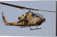 Framed AH-1S Tzefa helicopter in flight