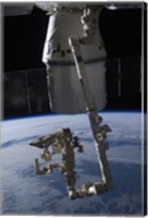 Framed SpaceX Dragon Commercial Cargo Craft Berthed to the ISS