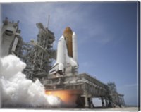 Framed Exhaust Plume forms under the Mobile Launcher Platform on Launch Pad 39A as Space Shuttle Atlantis lifts off into Orbit