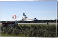 Framed Space Shuttle Atlantis Unfurls its Drag Chute upon Landing at Kennedy Space Center, Florida