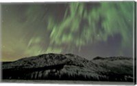 Framed Aurora Borealis over Mountain