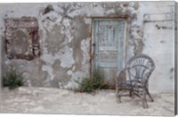 Framed Old Building chair and doorway in town of Oia, Santorini, Greece