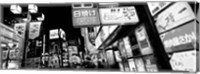 Framed Commercial signboards lit up at night in a market, Shinjuku Ward, Tokyo, Japan