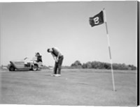 Framed 1960s Man Playing Golf Putting