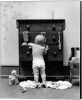 Framed 1940s Toddler Baby Pulling Clothes Out Of Bureau