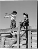 Framed 1950s Two Young Boys Dressed As Cowboys