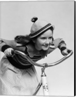 Framed 1930s Smiling Eager Little Girl In Knit Cap And Sweater Riding Bike