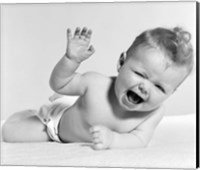 Framed 1950s Baby Lying On Stomach Laughing
