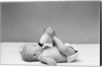 Framed 1940s Baby Prone Drinking From Milk Bottle