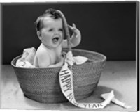 Framed 1940s Baby In Wicker Basket With Happy New Year Banner