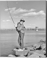 Framed 1980s Boy Fishing On Riverbank