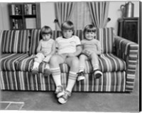 Framed 1970s Three Siblings Sitting On Couch