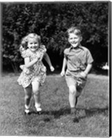 Framed 1930s 1940s Boy And Girl Running In Backyard