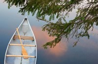 Framed Canada, Quebec, Eastman Canoe On Lake At Sunset