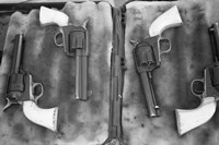 Framed Guns On Display For A Cowboy Mounted Shooting Competition