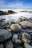 Framed Sunrise On Coast Beach And Rocks