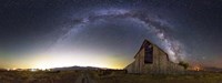 Framed Milky Way panorama over old barn