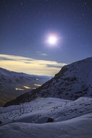 Framed Moon Above the Snow-Covered Alborz Mountain Range in Iran