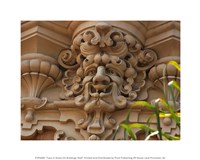 Framed Face In Stone On Buildings Wall