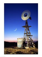 Framed Industrial windmill at night, California, USA