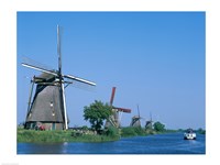 Framed Windmills and Canal Tour Boat, Kinderdijk, Netherlands