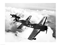 Framed High angle view of four fighter planes flying in formation, F6F Hellcat