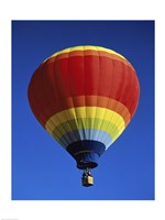 Framed Low angle view of a hot air balloon rising, Albuquerque International Balloon Fiesta, Albuquerque, New Mexico, USA