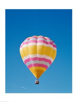 Framed Low angle view of a hot air balloon in the sky, Albuquerque, New Mexico, Yellow & Pink
