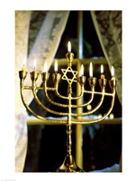 Framed Close-up Of Lit Candles On A Menorah And Window