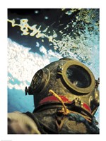 Framed Close-up of a divers helmet under water