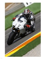 Framed Garry McCoy riding the Ilmor X3 MotoGP
