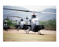 Framed Three AH-1 Cobra gunship helicopters