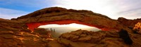 Framed Mesa Arch glowing at sunrise, Canyonlands National Park, Utah, USA